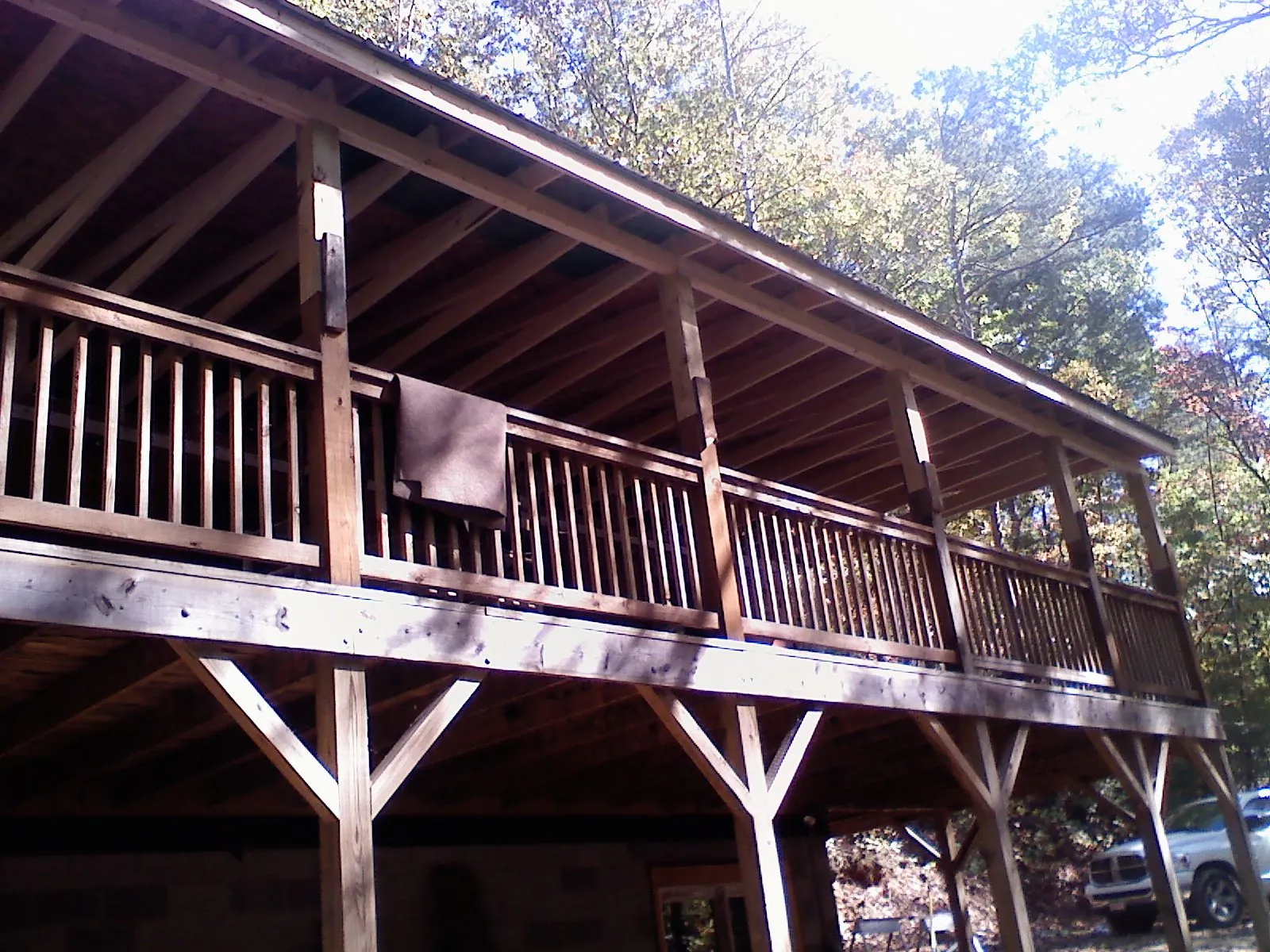 Timber framing under a new elevated porch and deck — Roof Leak Repair in Yarmouth by Roofing Brothers
